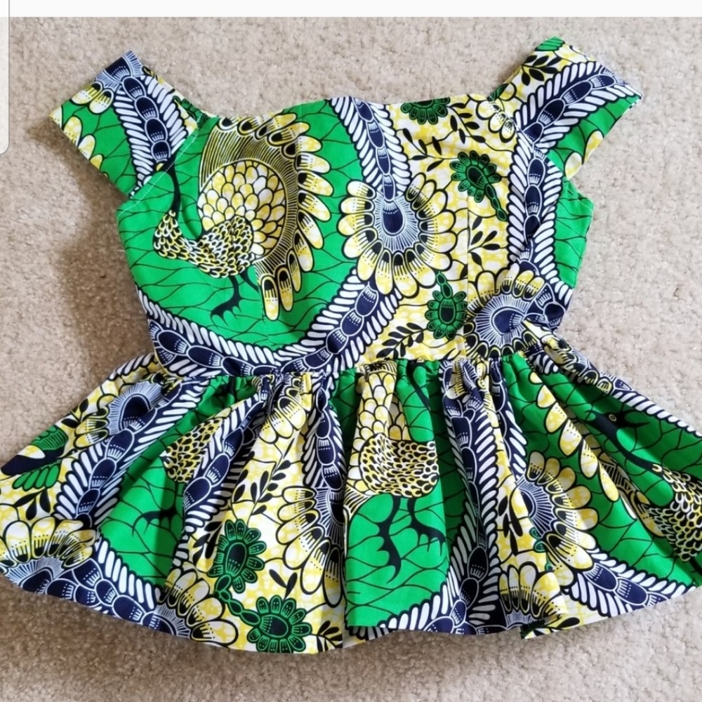 Beautiful African print peplum blouse.